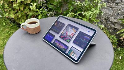 An iPad Pro on a table in a garden